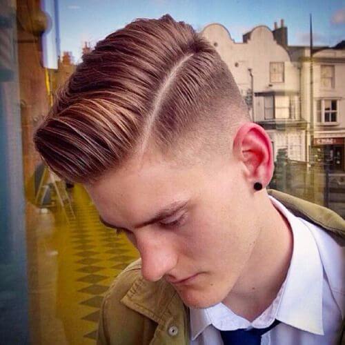 A Man With A Polished Fade Hairstyle