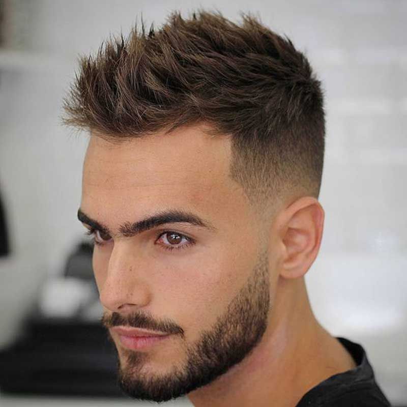 A Man With A Faux Hawk Hairstyle