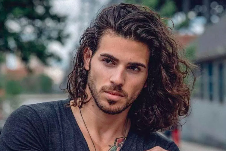 Man With A Long Curly Hair