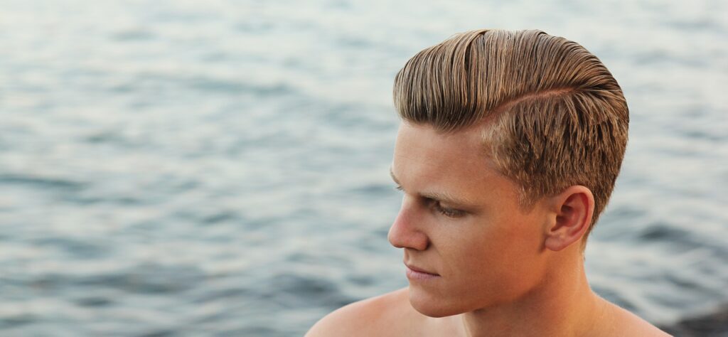 Man's Hair Styled at the Beach